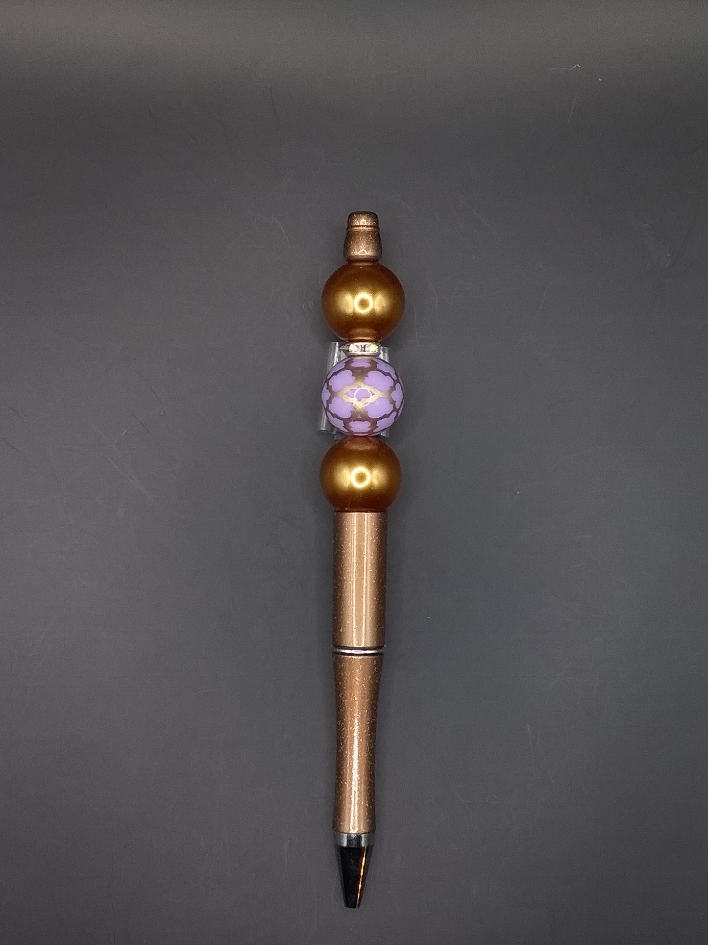 P73 Brown Pen Gold Beads