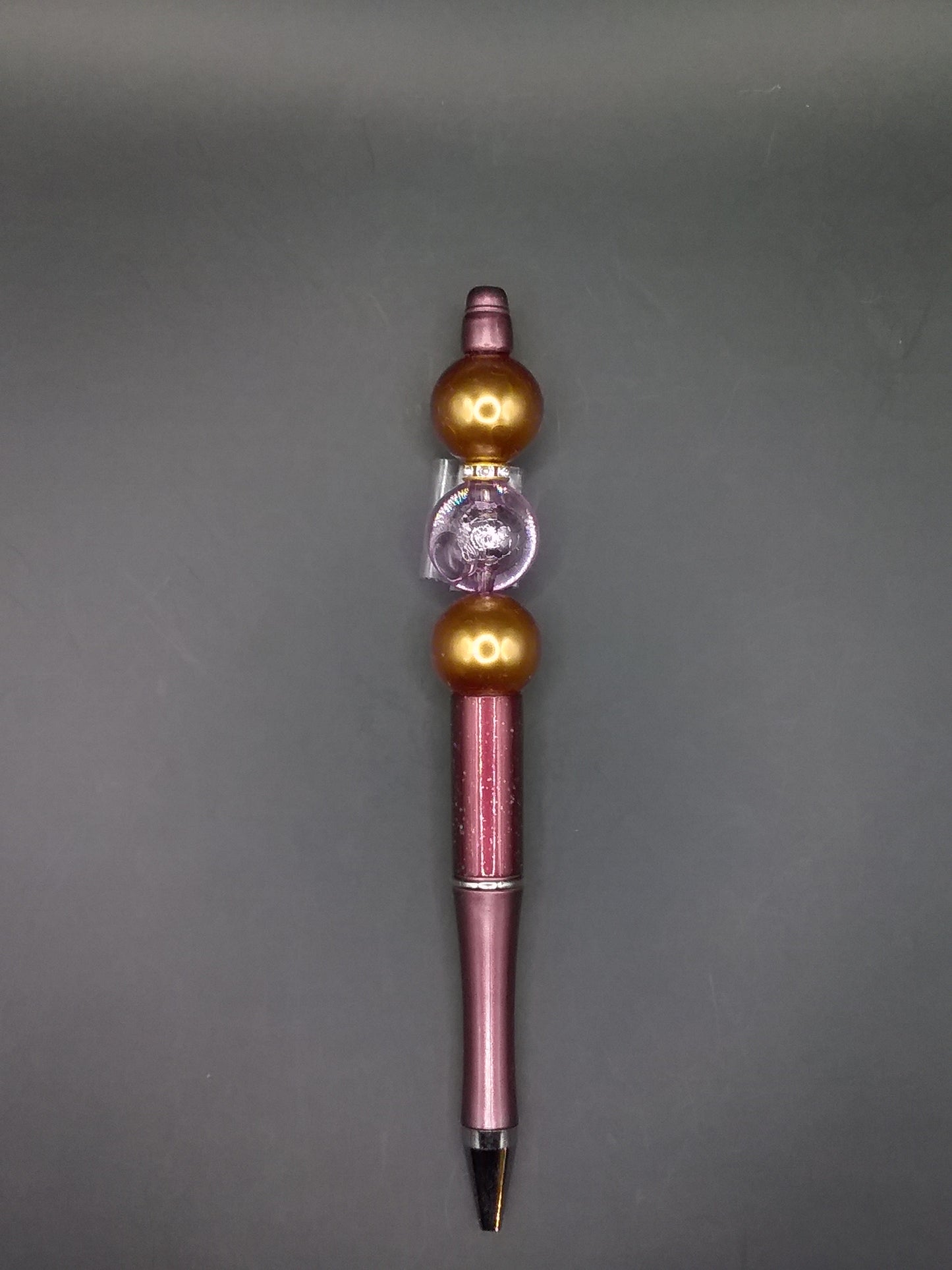 P67 Brown Pen Gold Beads
