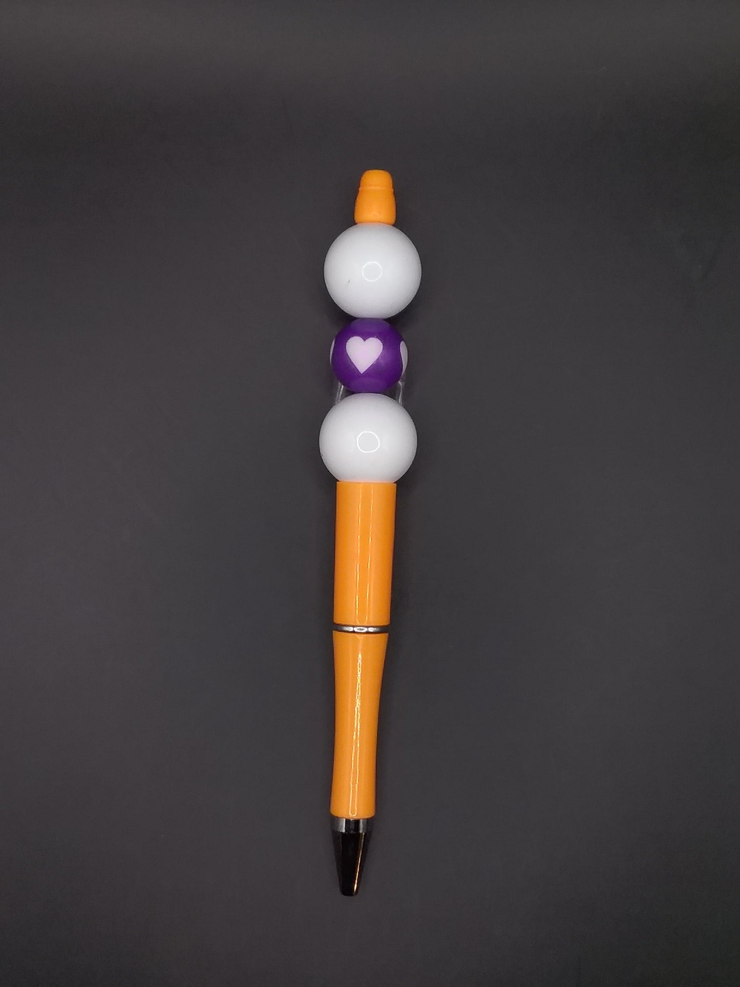 P60 Orange Pen White and Purple Heart Bead